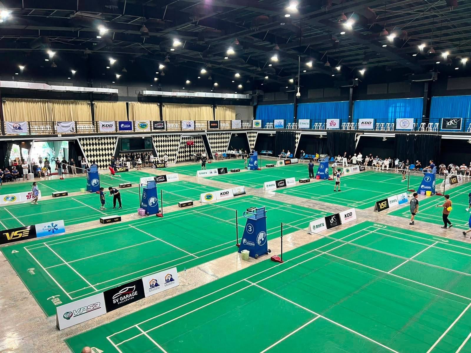 Courts at Lanexang Badminton Center during a tournament